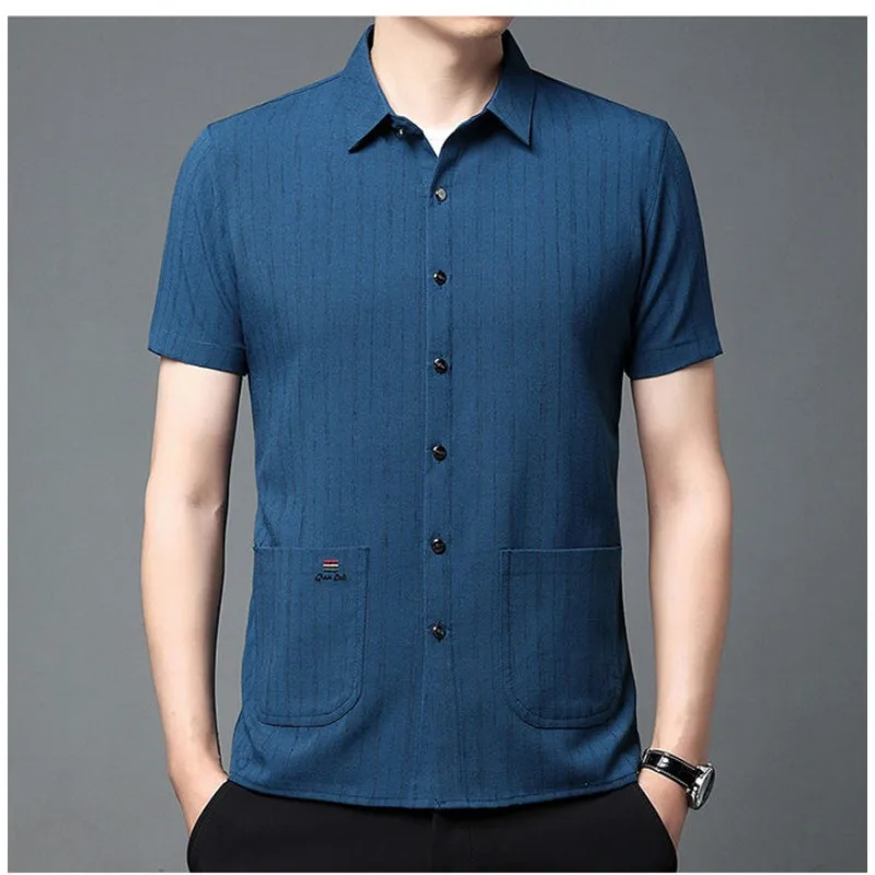 New Casual Trend Men\'s Solid Color Lapel Shirt Summer Men\'s Clothing Single Breasted Pocket Cotton Linen Short Sleeved Shirt Top