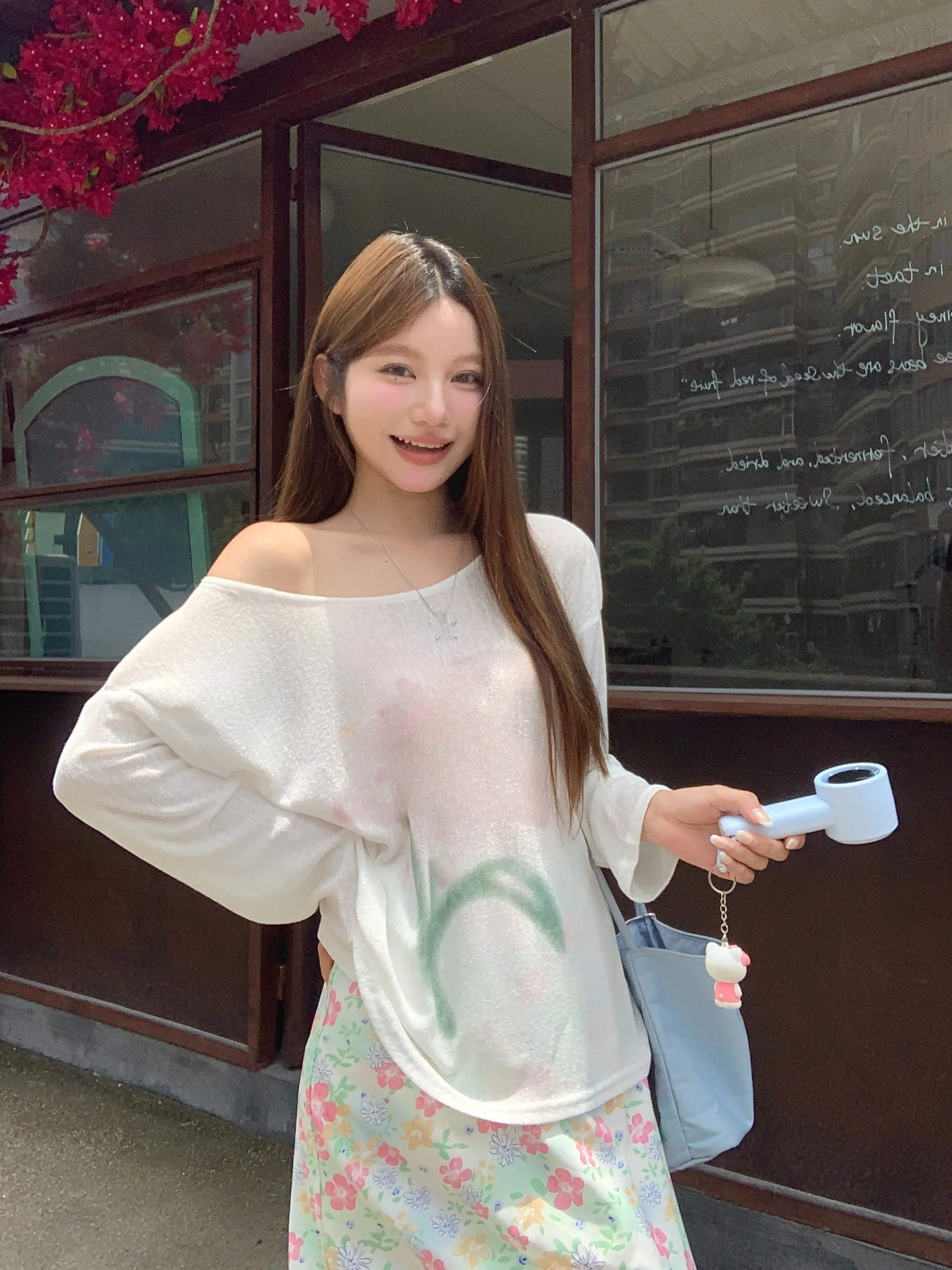 T-shirt da donna estiva casual ampia lunga Sve bianca con protezione solare T-shirt coreana con stampa Sle Moisture ng Pianta motivo floreale