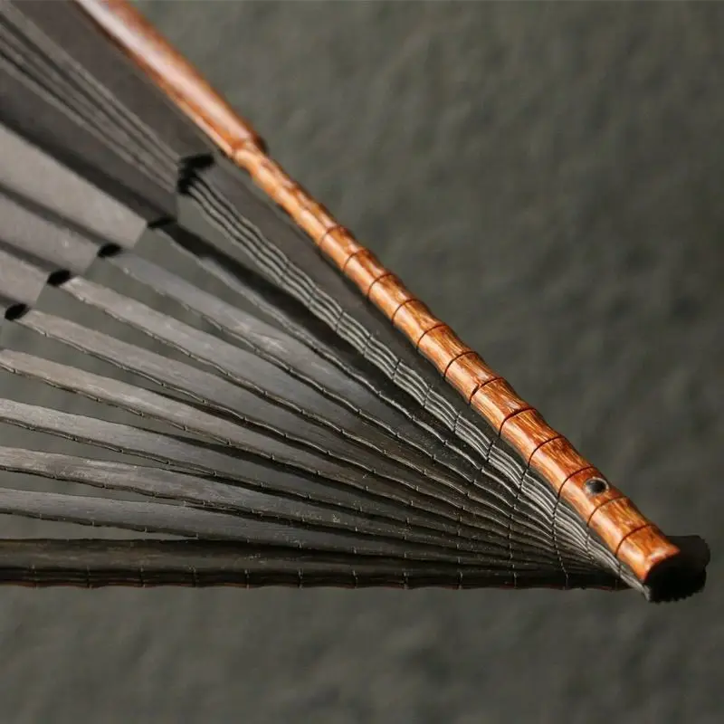 

Seiko Knuckle Ebony Bone Folding Fan Bamboo Fan