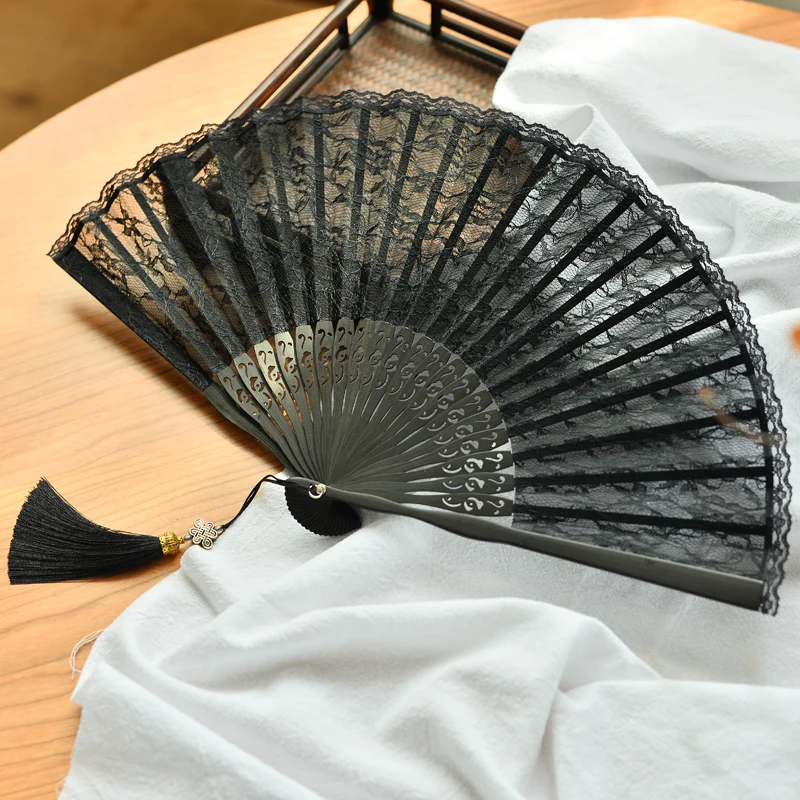 

Double black lace sexy folding fan cheongsam fan Republic wind dance Hanfu catwalk hollow women's carry-on