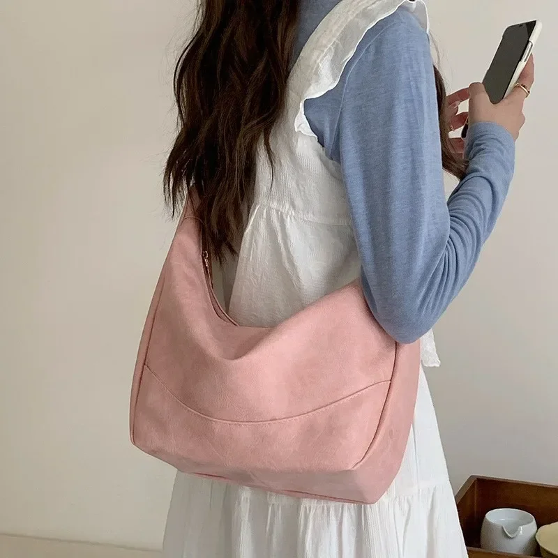 

Large-capacity dumpling women's bag 2024 new summer shoulder messenger bag, pink tote bag for students to commute to class