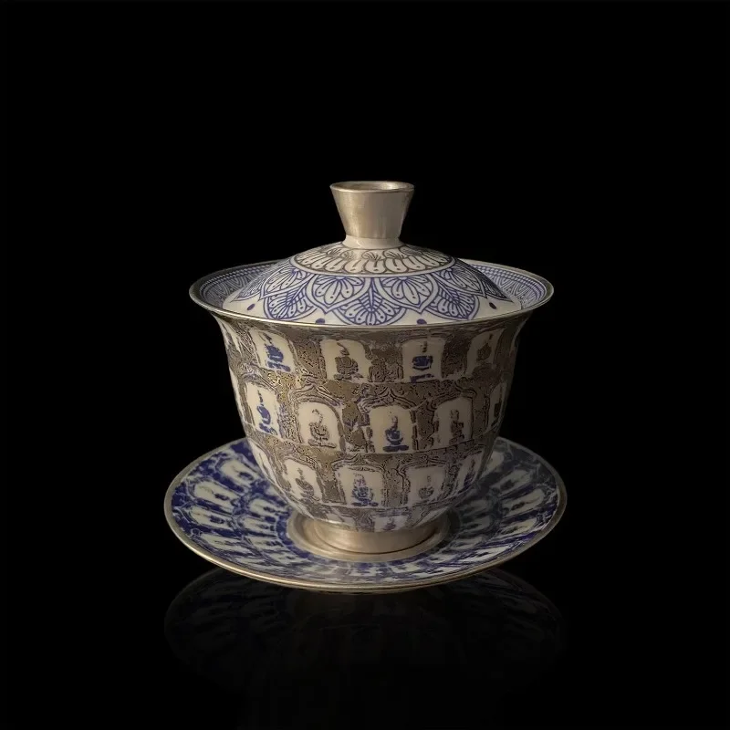 Master craftsman traditions, Chinese glazed pottery, gold-plated silver Buddha statues, covered teacups, inspired Buddhist tea