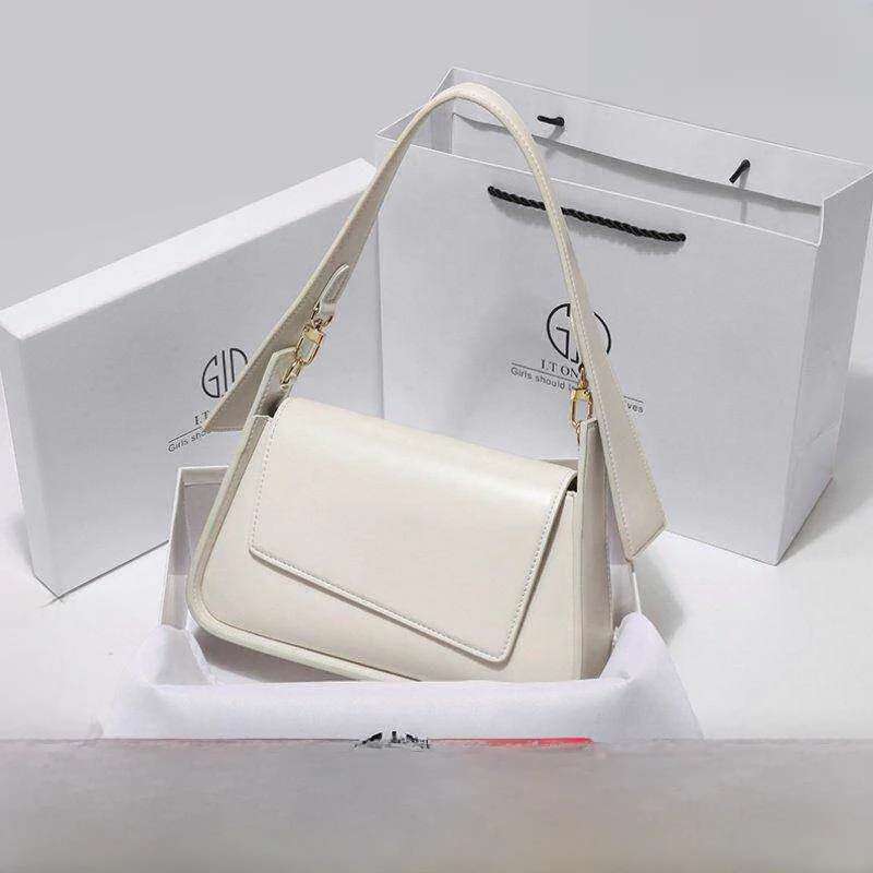 

Hong Kong Genuine Leather Women's Bag 2026 New Spring Summer Retro Commute High-End Sensation Single Shoulder Armpit Small Bag