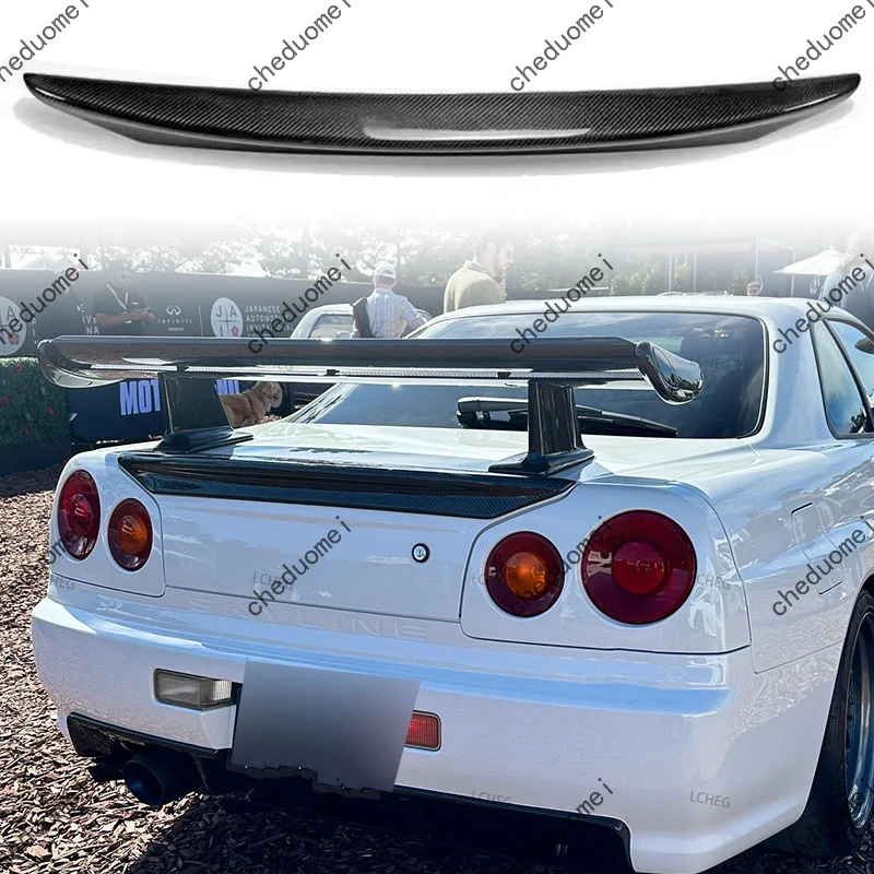 Подходит для Nissan Skyline GTR R34 GTT 1999-2002 годов выпуска. Задний спойлер на крышку багажника из карбона. Аэродинамический элемент для стайлинга автомобиля.