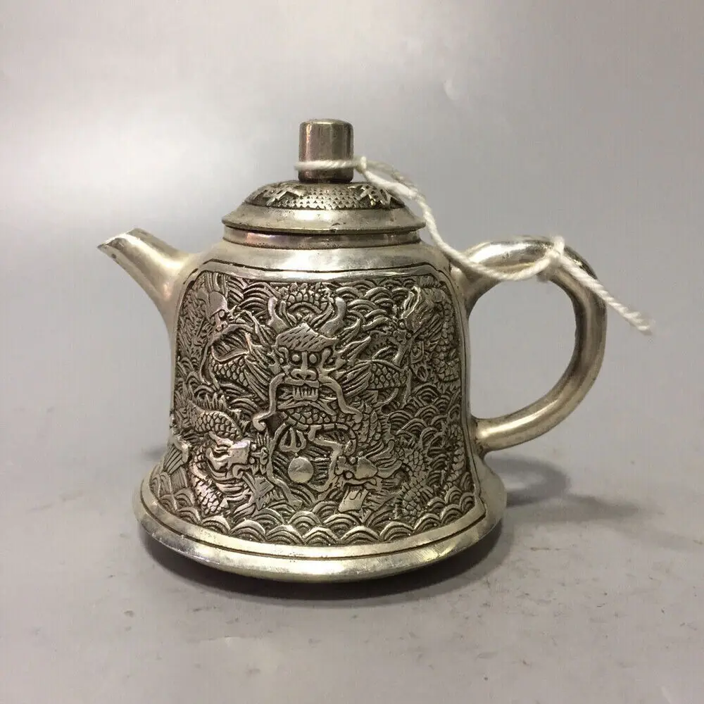 

Asian Chinese Old Tibet Silver Hand-carved Dragon Teapot