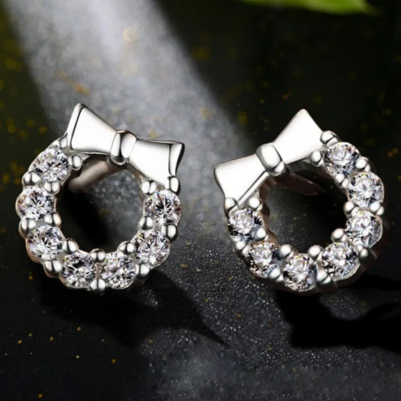 Glamourous Sparkle: Silver Color Cubic Zirconia Bow and Circle Stud Earrings for Women - A Timeless Accessory Elegant Occasions