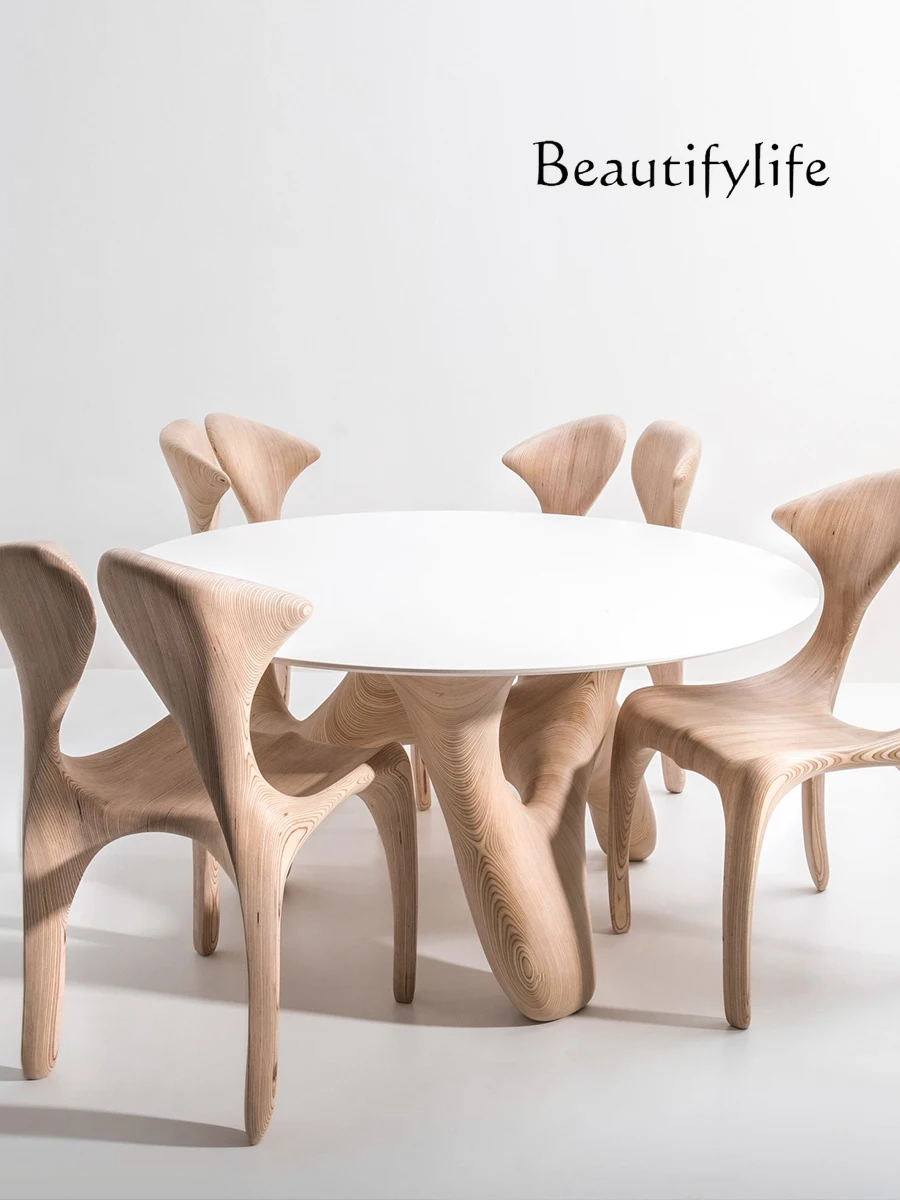 Postmodern round solid wood dining table large round table Italian light luxury high-end  special-shaped dining seat combination