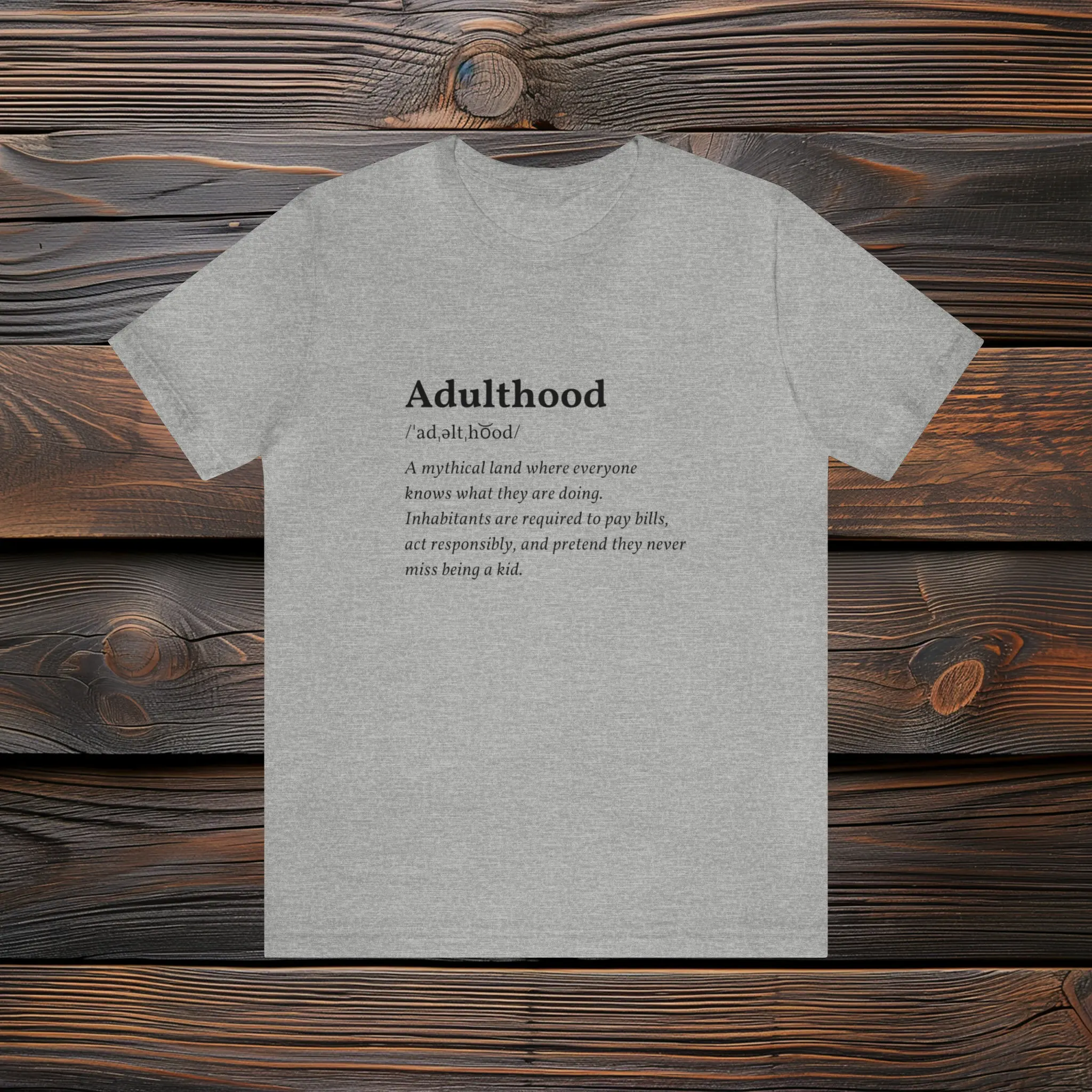 Adulthood - Definition Tee | Funny T-Shirt, Quirky Comfort for The Reluctant Grownup By PromptDesignArt