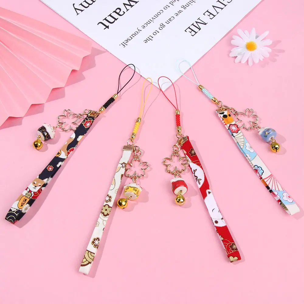 Lucky Cat Bells แขวนเชือกโทรศัพท์สายคล้อง Anti-Lost Lanyard Lucky Cat Bell SAKURA โทรศัพท์ Lanyard พวงกุญแจเชือกข้อมือ