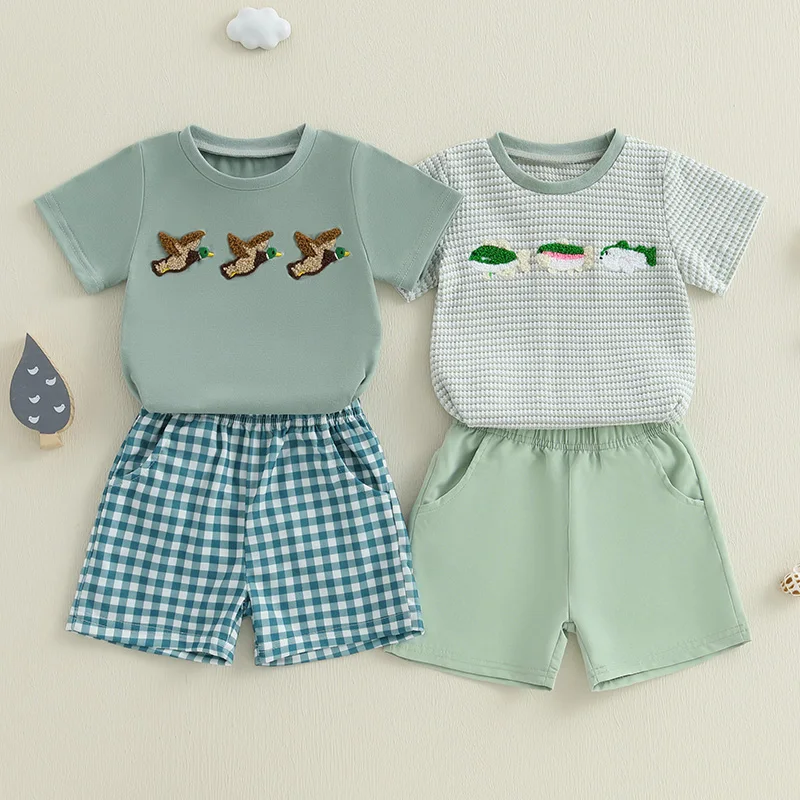 2024-12-17Lioraitiin Toddler Baby Boy Shorts Set Fish/Duck Embroidery Short Sleeve T-shirt Solid/Plaid Shorts 2 Piece Summer Set