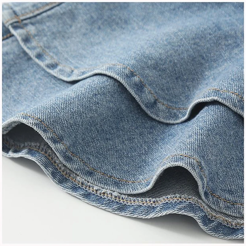 ملابس الصيف للفتيات على الطراز الكوري لعام 2025 تنورة دينم مكشكشة للفتيات اليومية في الهواء الطلق تنورة جينز قصيرة غير رسمية ملابس الأطفال