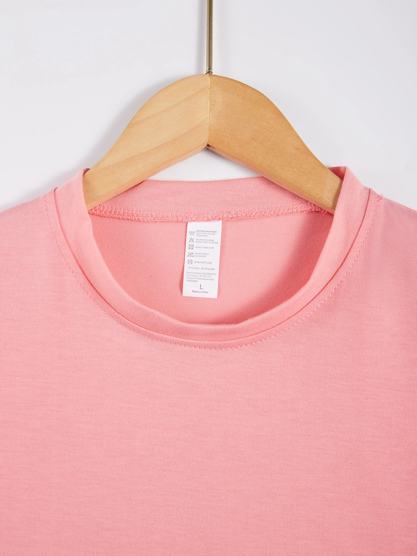 ピンク中空蝶プリント Retio Tシャツ女性の快適な Tシャツスポーツオールマッチ服クルーネックソフト半袖