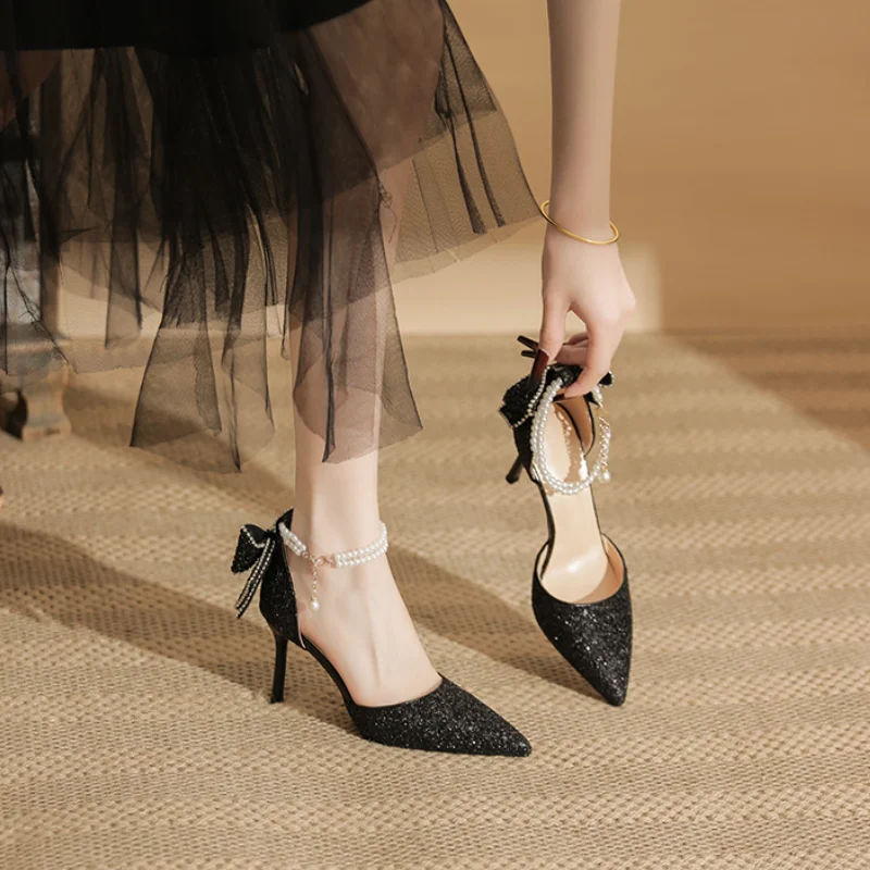 

2026 New Sequined Pointed Toe High Heels for Women Fashionable Pearl Ankle Strap Bow Stiletto Heel Ladies Wedding Dress Shoes
