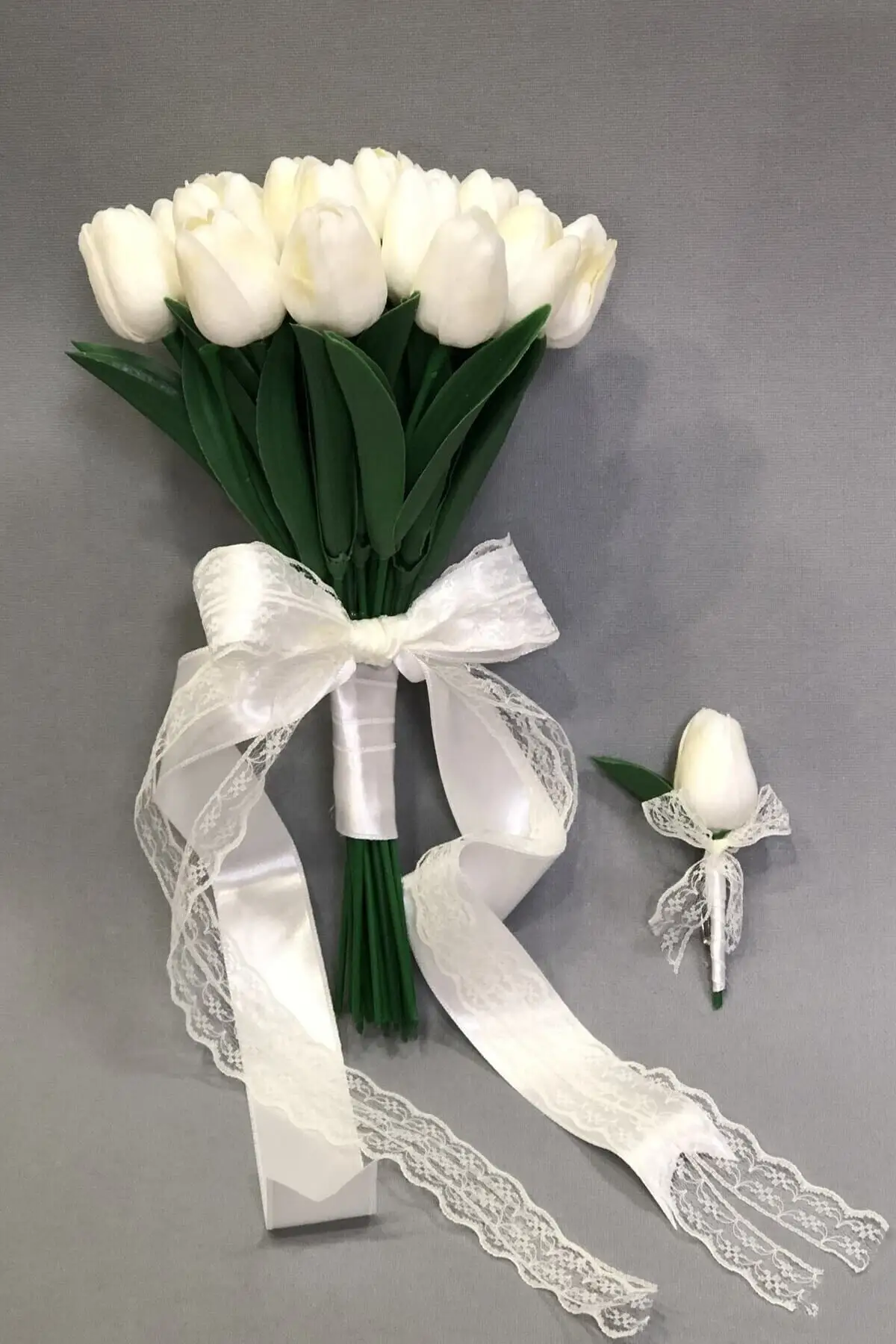 

Wet White the Laleli Bride Corsage And Boutonniere