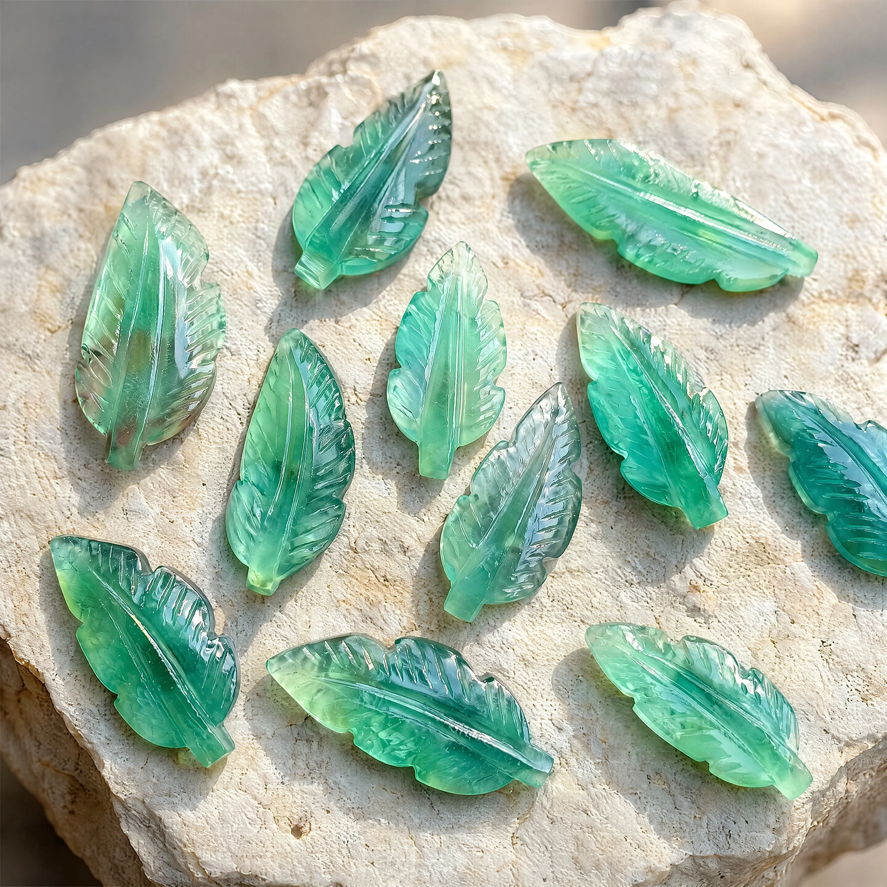 Green fluorite feather crystal decoration, elegant feather-shaped stone, bohemian style, featuring natural inclusions
