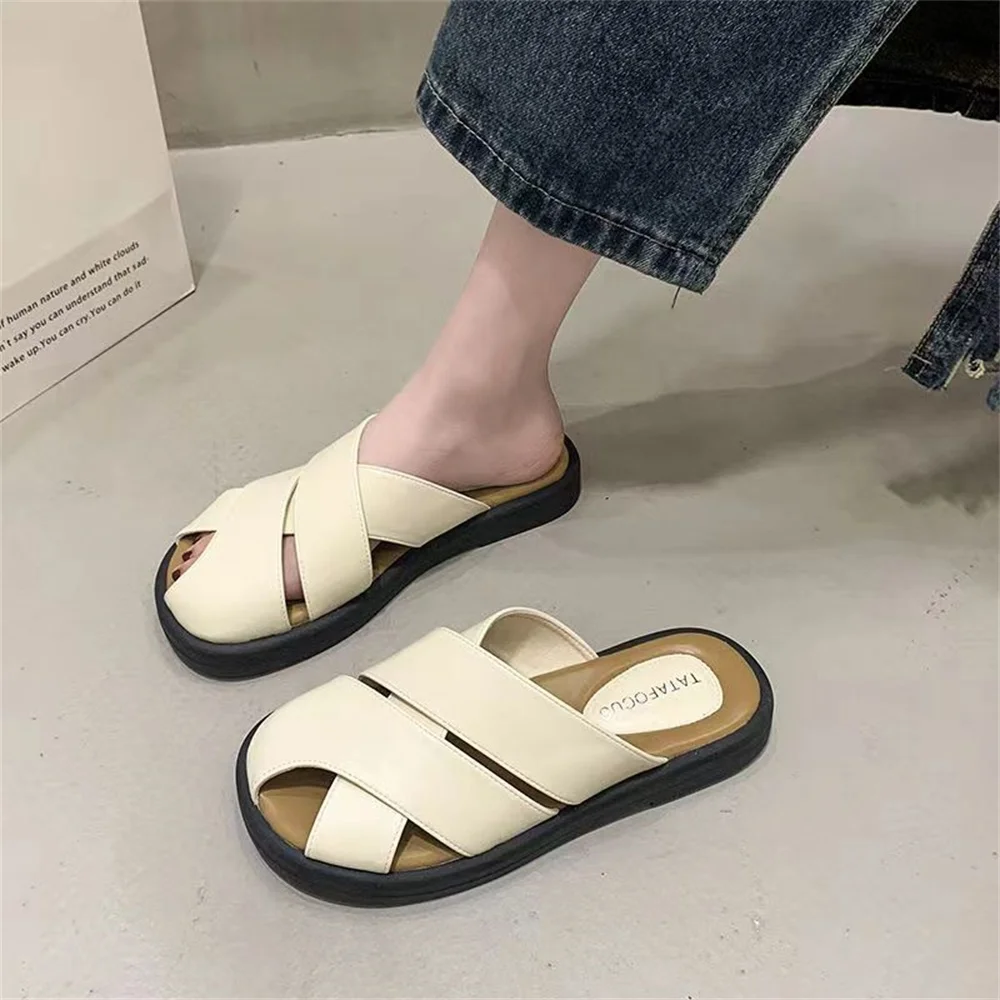 Baotou semi-slipper women wear pregnant women in summer, lazy people pedal office, Roman woven hollow muller shoes sandals.