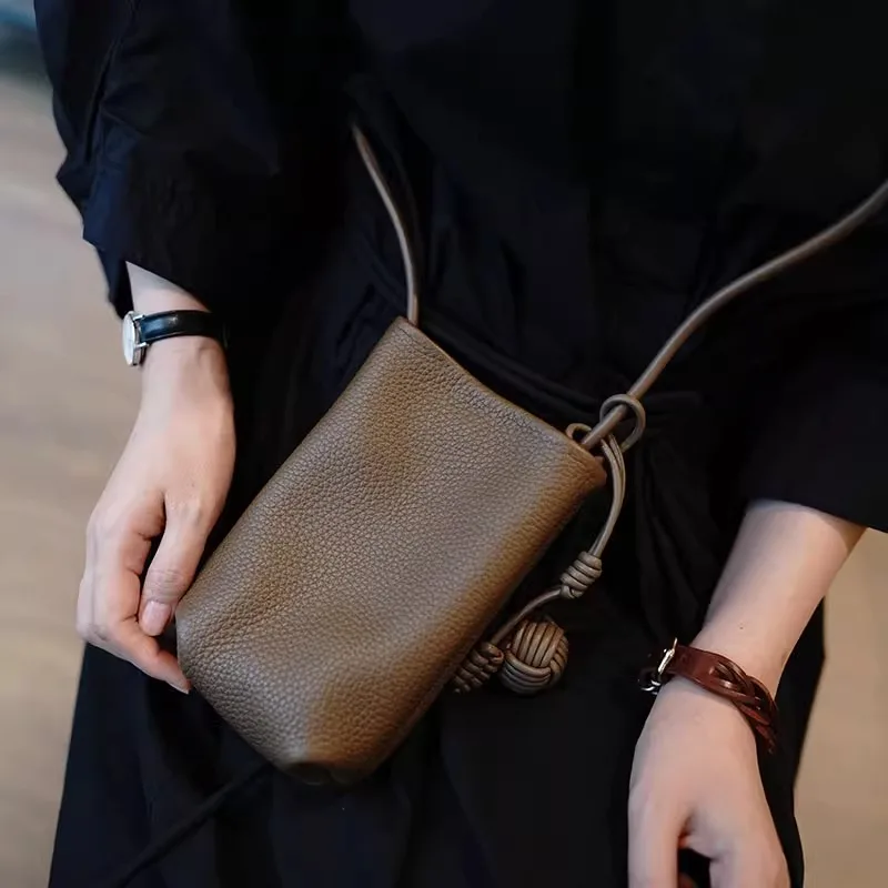 

With literary and artistic small fresh small round ball pendant, super hot crossbody mobile phone bag, soft leather cute mini sm