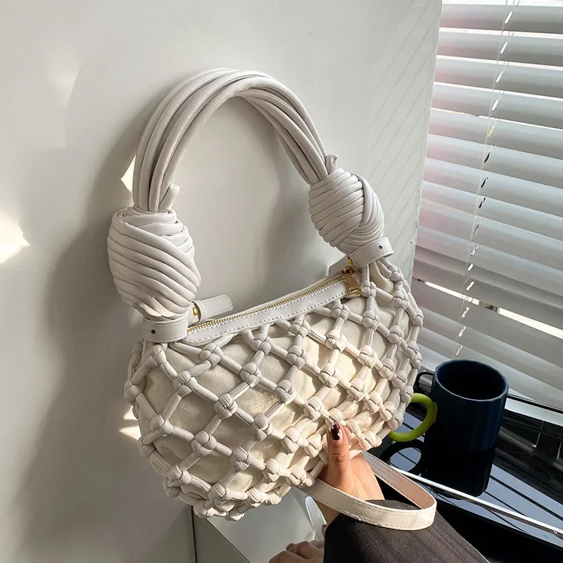 

Niche design bag female 2023 new fashion hollow woven shoulder axillary bag net red foreign qi handbag tide