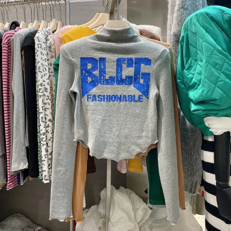 

Женская приталенная футболка с длинным рукавом, с буквенным принтом, укороченная, базовый слой, с воротником-стойкой, в корейском стиле, хлопок...