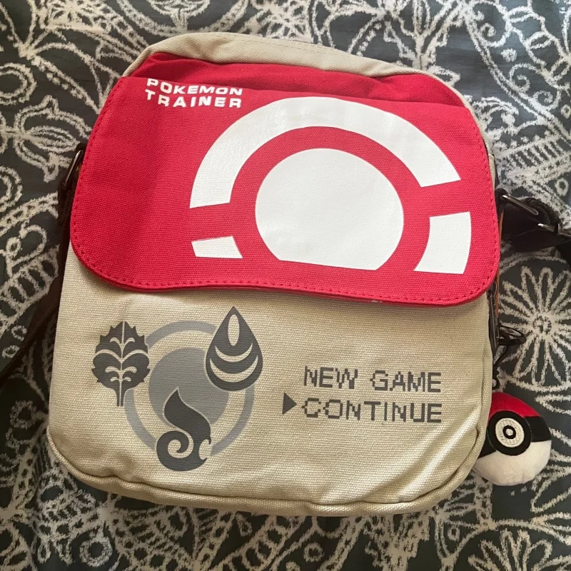 ポケモンキャンバスクロスボディバッグアニメテーマスイッチ収納カジュアルショルダーバッグ男性用日常使用ポケボールキーホルダー付き