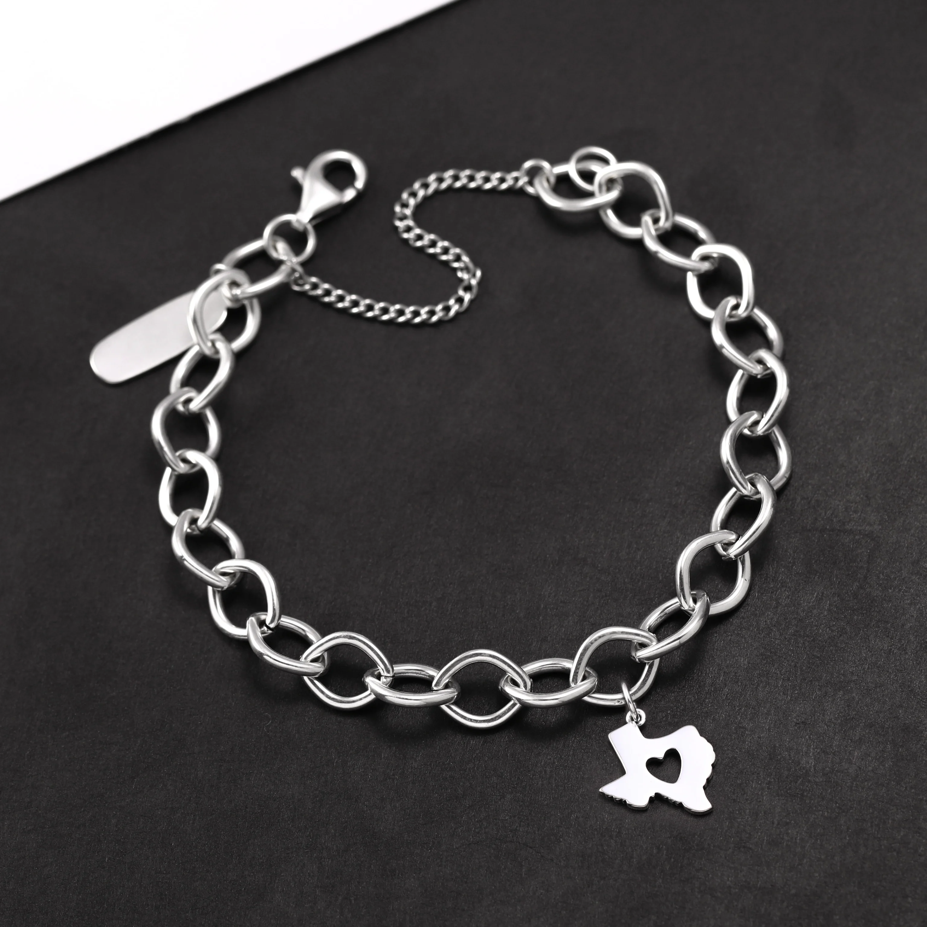 

Genuine 925 sterling silver Forged Link Charm Bracelet paired with the "In the heart of Texas" pendant