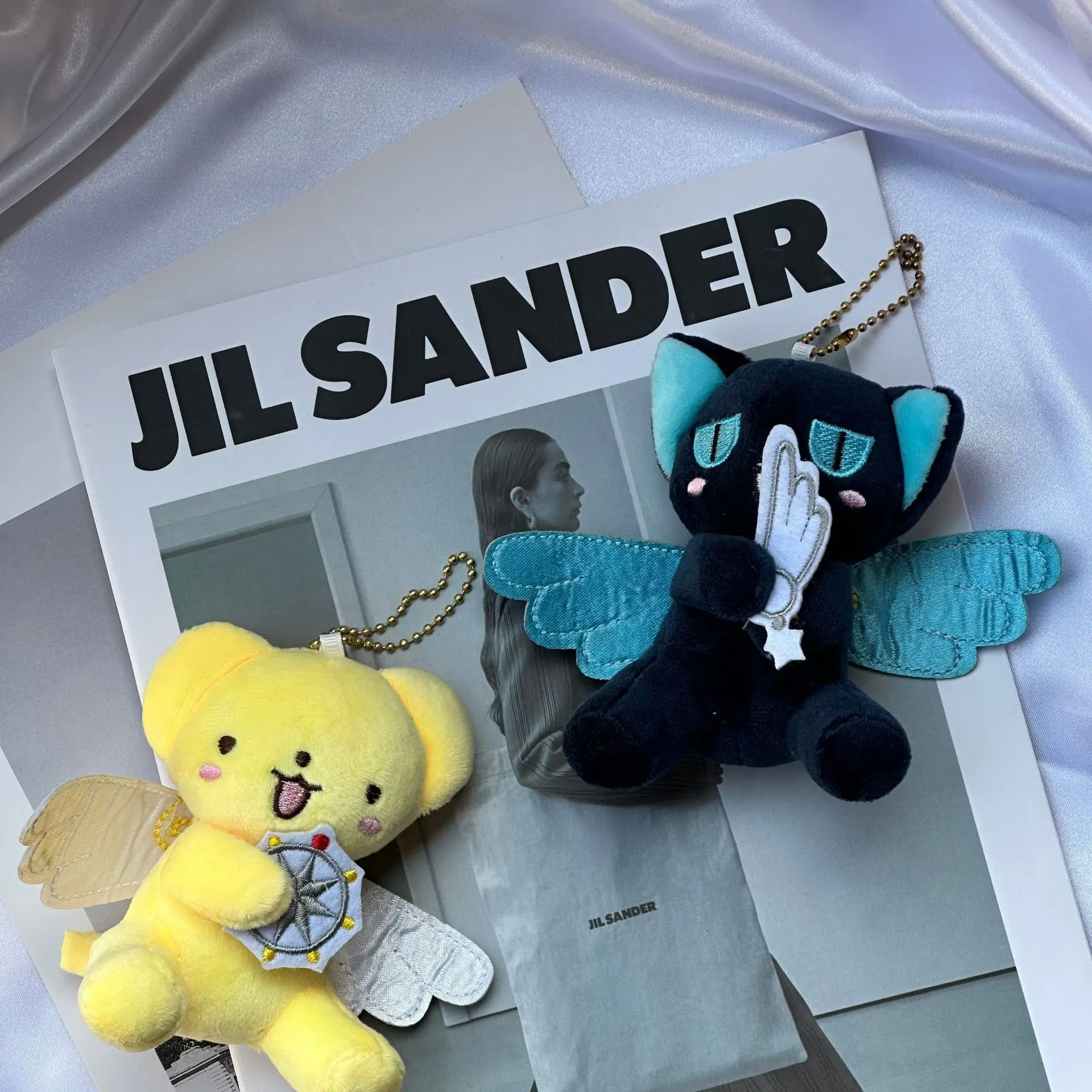 Nuevo dibujos animados Sakura Cardcaptor Kero muñeco de peluche juguetes colgante Anime tarjeta Captor muñeca lindo llavero de peluche suave juguete regalo para niños