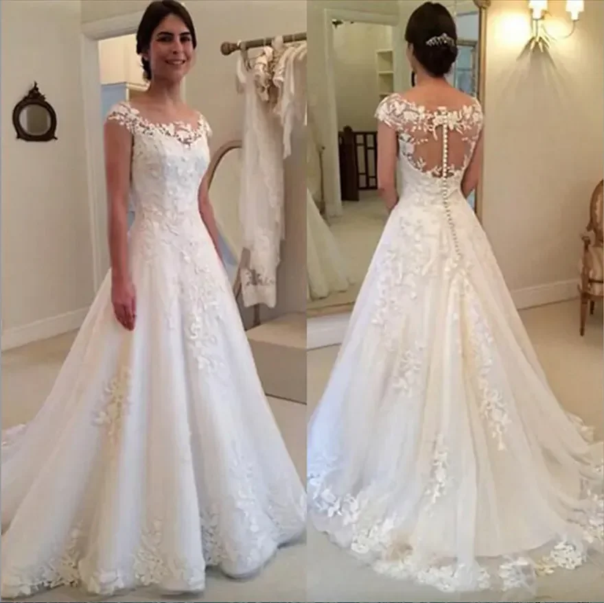 

High Quality Sheer See Through Bridal Dresses with Lace Appliques Covered Buttons Back Cap Sleeve Wedding Dress Customized