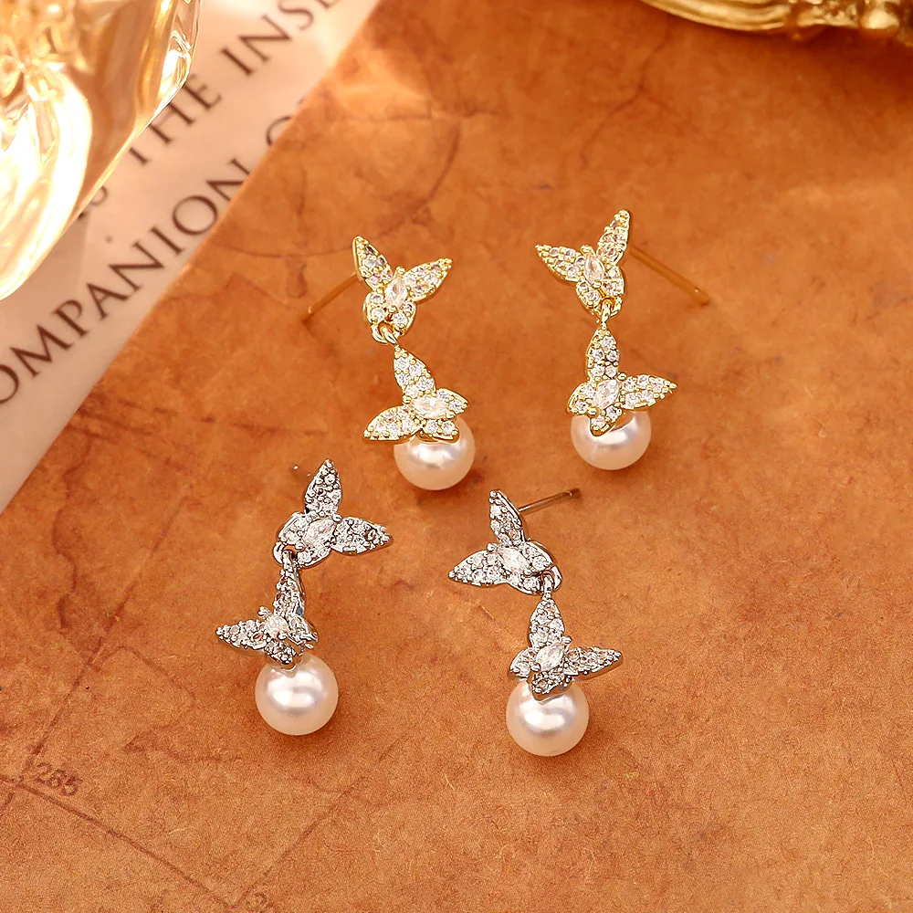 

Micropaved zircon butterfly pearl earrings, fashionable, personalized, versatile earrings, niche design, exquisite earrings