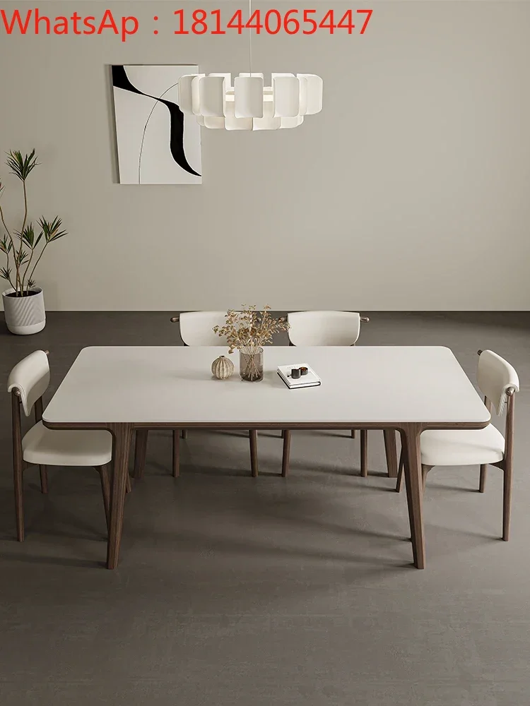 

Solid wood slate dining table modern simple imported ash solid wood legs rectangular matte white slate dining table and chairs