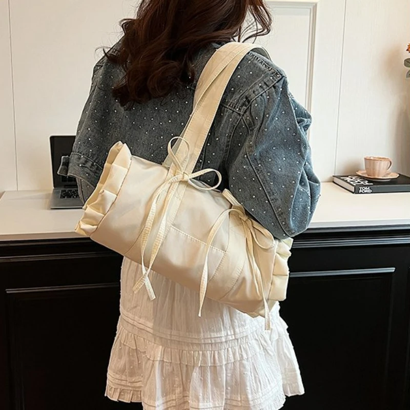 Fresh Sweet Bow Shoulder Bag Fashionable Solid Color Small Popular High end Boston bag Casual Commuting Shoulder Underarm Bag