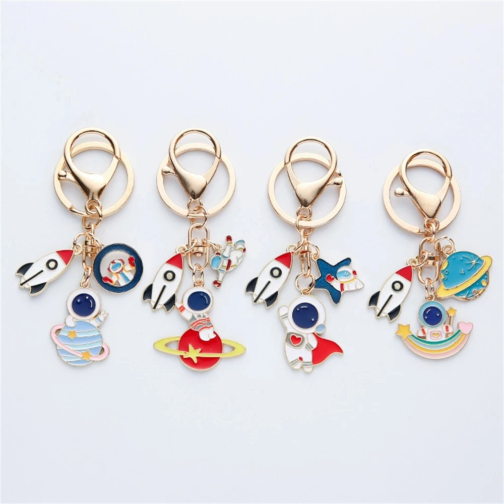 

Cute Cartoon Pattern Spaceman Keychain Creative Astronaut Rocket Space Charm Pendant For Backpack Handbag Key Hanging Decoration