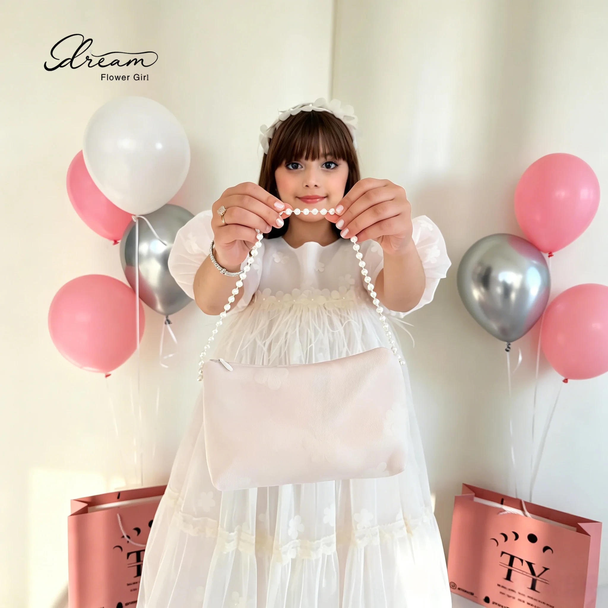 The white long dress of the lovely girl features a round neckline, paired with ruffled puff sleeves and a fluffy skirt.