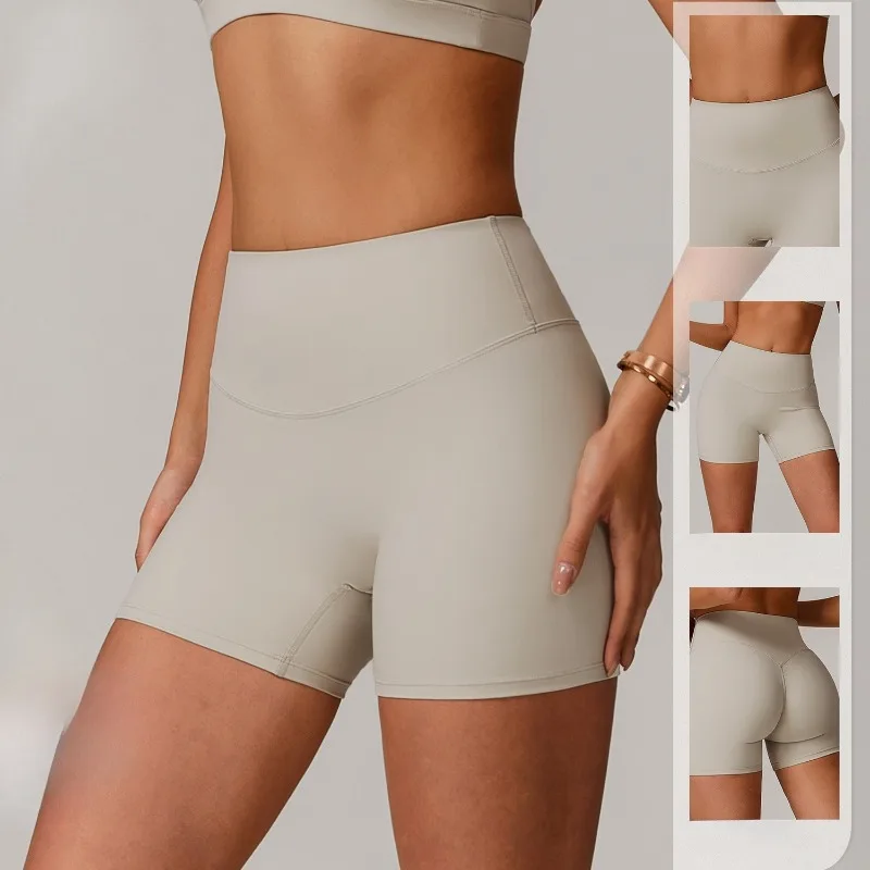 Pantaloncini da yoga transfrontalieri a vita alta e sollevamento dei fianchi indossati su pantaloncini sportivi attillati, dimagranti e da corsa per un look femminile