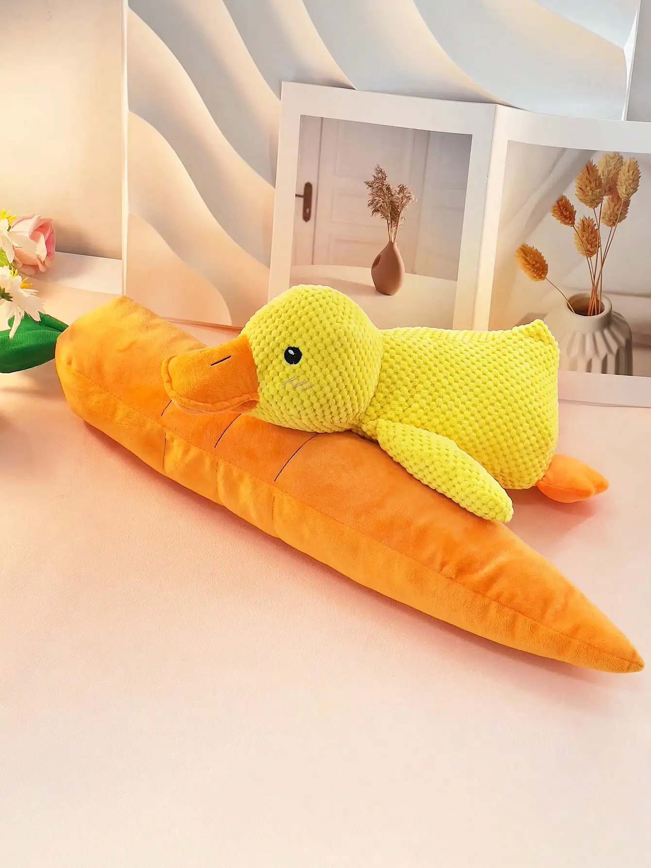 large, yellow, large duck pet stuffed toy that squashes and plays with the dog can be used as a pillow for pets only