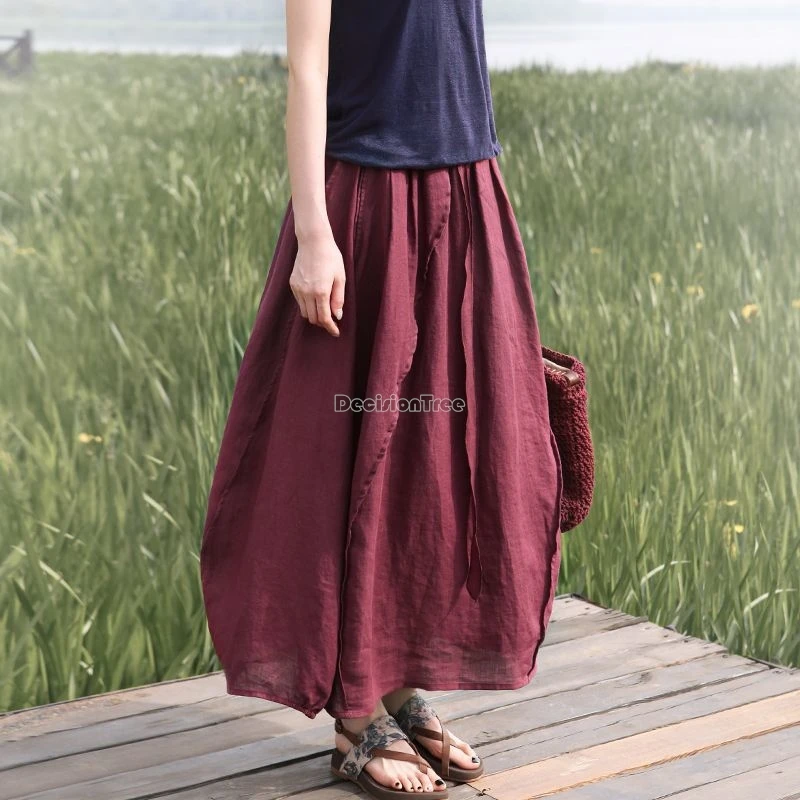 تنورة نسائية غير رسمية فضفاضة جديدة ربيعية طويلة لعام 2025 من القطن والكتان بتصميم غير متماثل بنصف برعم الزهور