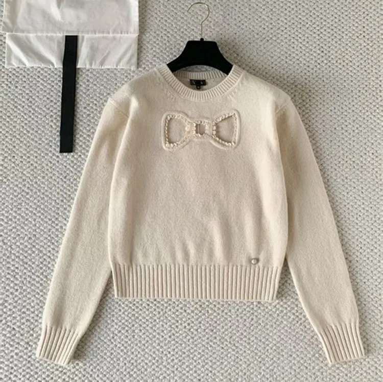

Customized New Winter 2025 styles of European and American women's clothing Long-sleeved bow wool knitted sweater