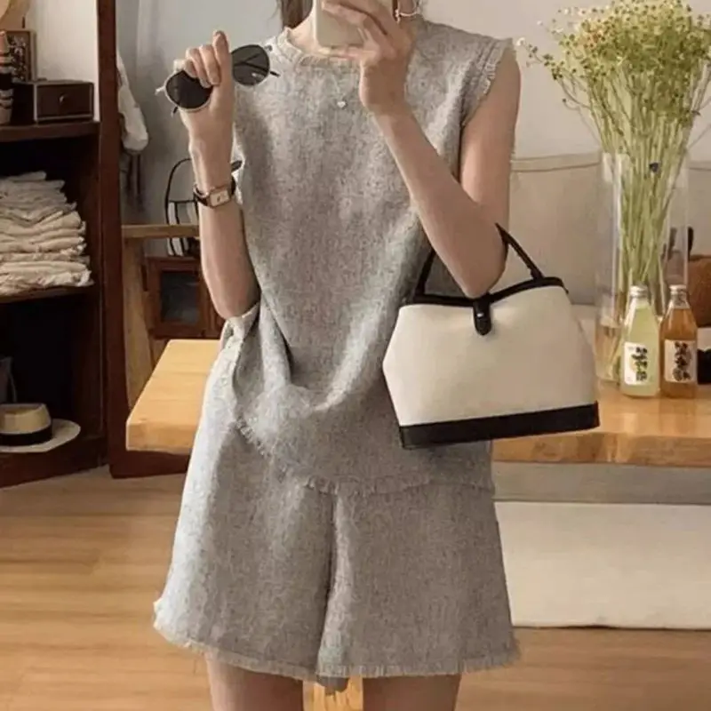 

Новый летний модный женский комплект из двух предметов с кисточками, элегантный жилет без рукавов + повседневные свободные шорты с высокой талией, твидовый костюм