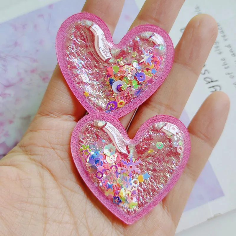 20pcs PVC Quicksand Cartoon Heart trasparente Bling Flowing patch Appliques per accessori per fascia per bambini fai da te