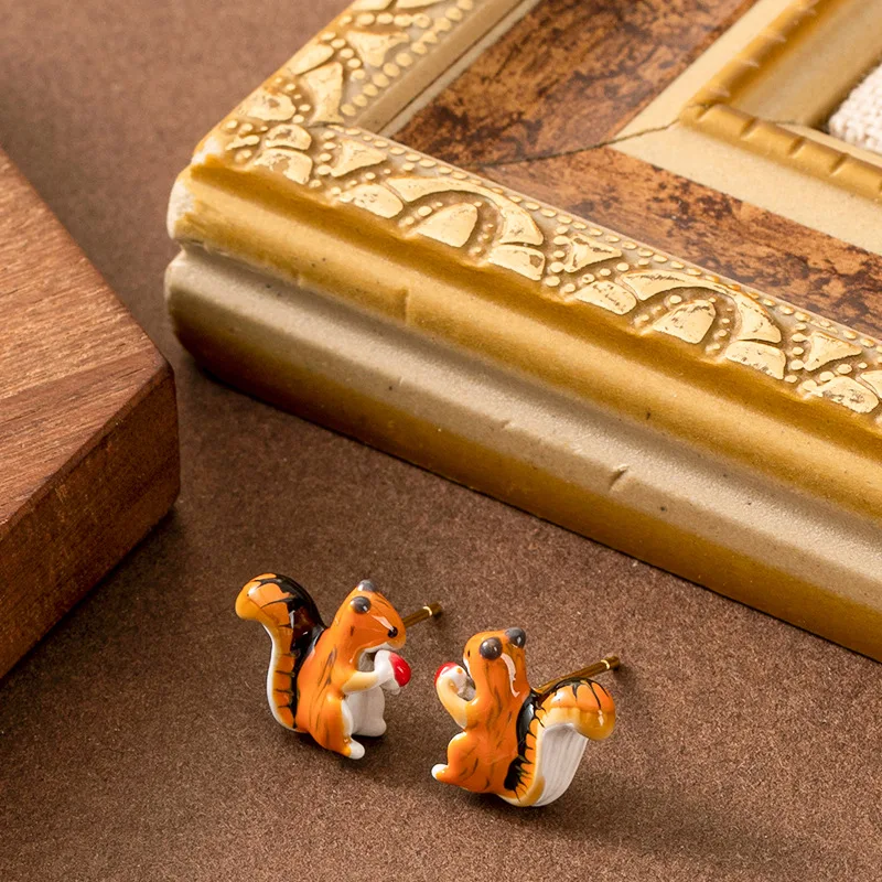 Fashionable, sweet and exquisite hand-painted enamel drop glaze cute little squirrel earrings niche design earrings