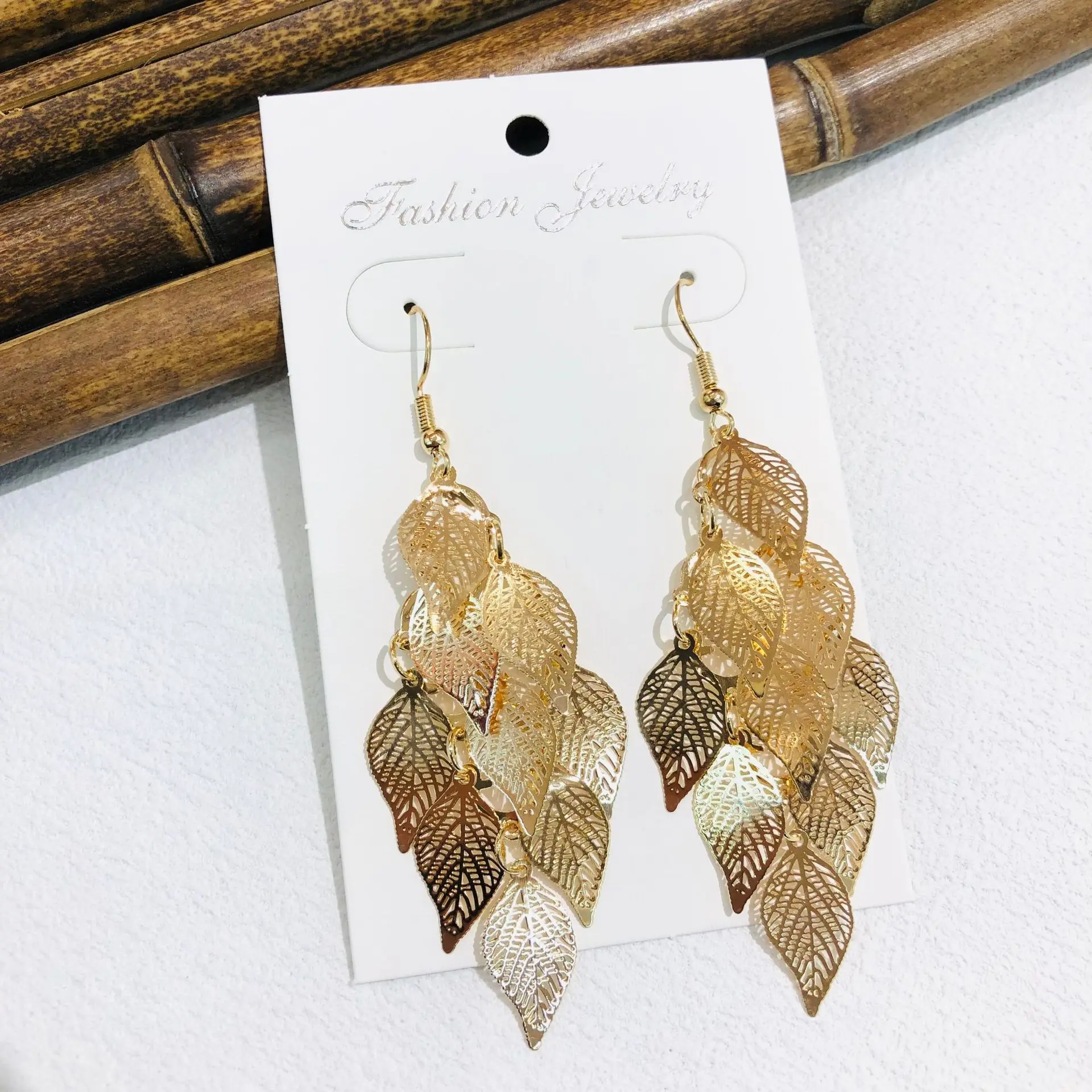 brincos-marrons-longos-de-metal-exclusivos-estilo-americano-ganchos-de-orelha-com-borla-de-flor-de-folha-de-borboleta-roxa-versatil-e-requintado-para-uso-diario