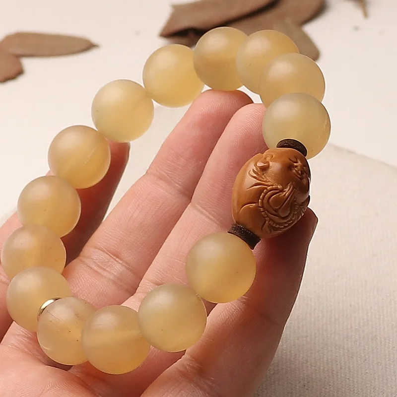 

Natural Horn Round Bead Bracelet: Blood Vein Buddhist Beads, Olive Carved Buddha Single Loop Rosary, Men's Gift