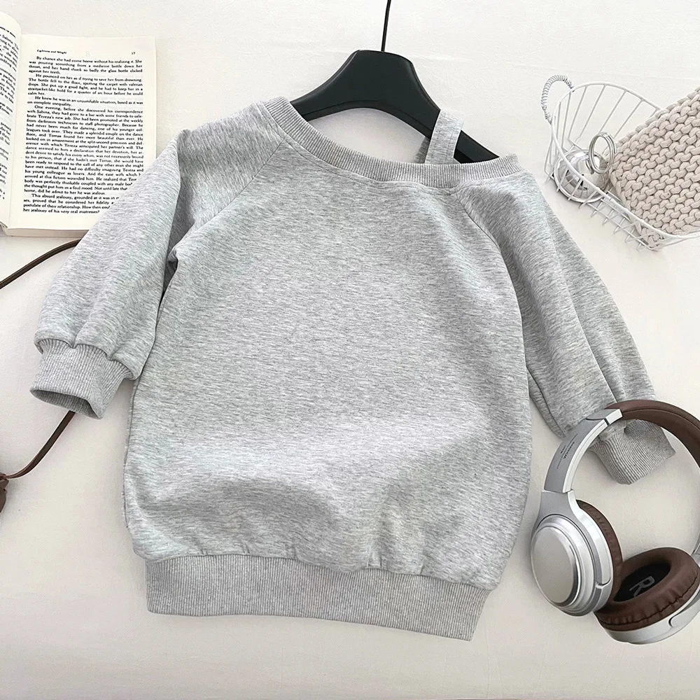 

Girls' foreign style fashionable medium and long sweater autumn 2025 new Korean version loose off-the-shoulder solid color long-