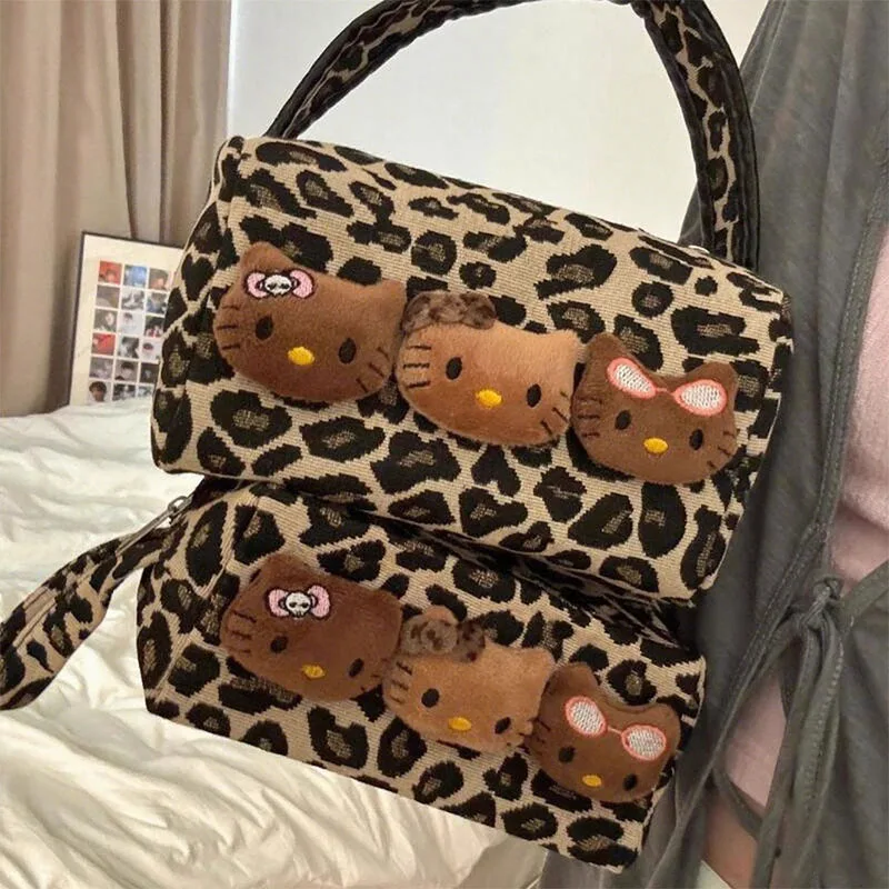 Miniso Hellokitty trousse de maquillage Kawaii motif léopard sac de rangement à main en cuir noir Kt trousse de rangement de toilette sac à main