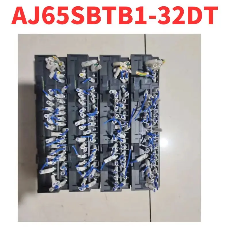 Second-hand AJ65SBTB1-32DT PLC module, no repair