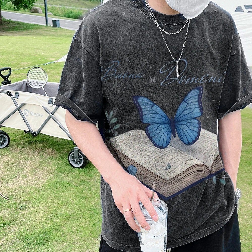 

Y2k Graphic Tee, Enchanting Butterfly on Book Print with Text, Magical & Literary, Soft Fabric for Fantasy - Filled Casual Looks