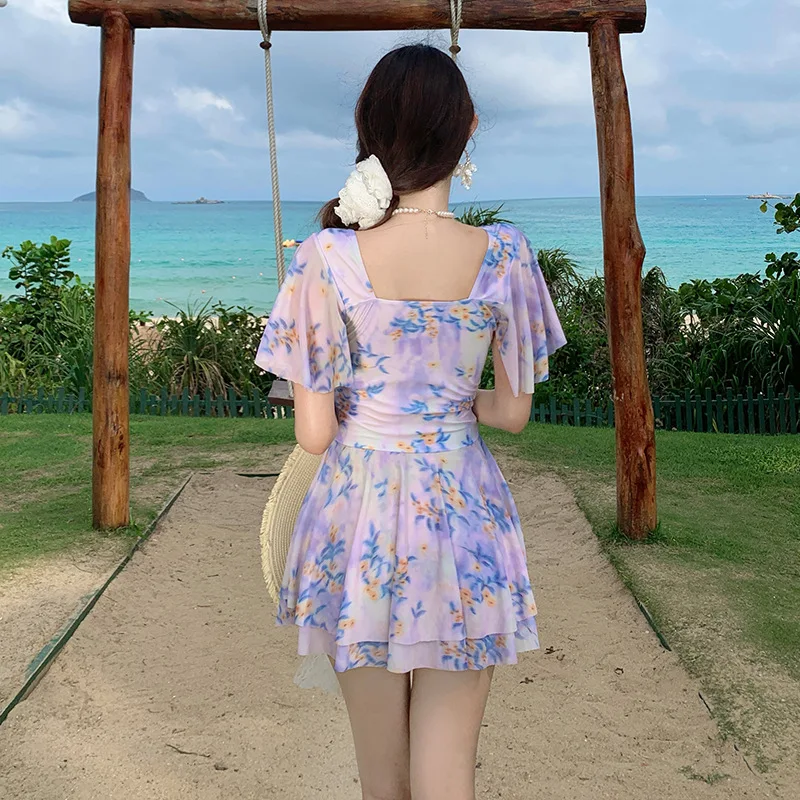 Costume da bagno intero con gonna da donna, stampa floreale dolce e elegante, costume da bagno da vacanza al mare chic a mezza manica modesto