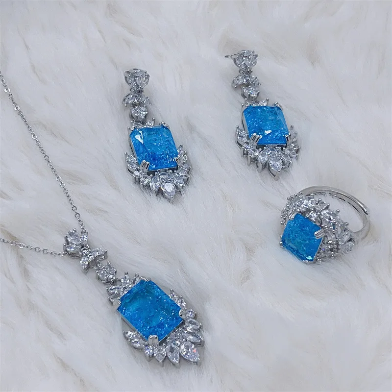 

Высококачественные комплекты ювелирных изделий из ледяного хлопка с глубоким морским синим квадратным драгоценным камнем, серебро 925, роскошное кольцо с бриллиантами, ожерелье, серьги для женщин