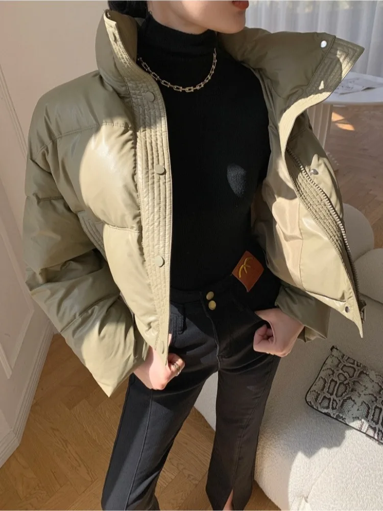 Retro Sli Design PU Leather Cotton Jaet Women's Korean Version ort Thiened Bread Sle Outerwear Stand Collar