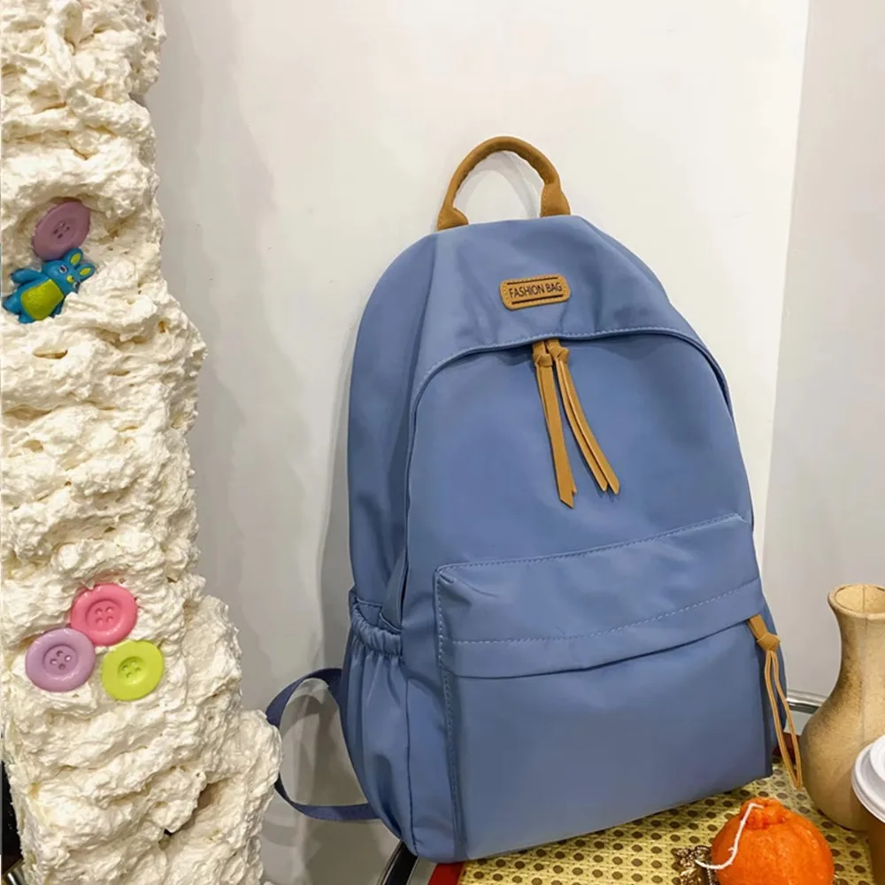 Durável cor sólida saco de escola moda náilon grande capacidade saco leve casual estudante mochila uso escolar
