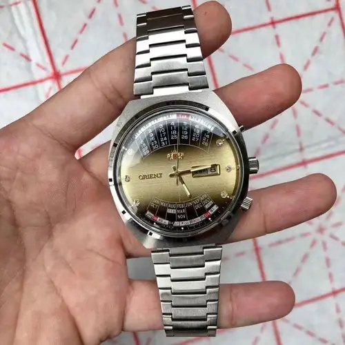 Reloj mecánico automático unisex Orient con esfera grande giratoria, hora mundial de acero inoxidable totalmente funcional